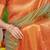 Light olive green silk blend kanjivaram saree with orange zari border