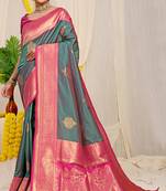 Teal silk blend kanjivaram saree with rani pink zari border