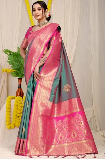 Teal silk blend kanjivaram saree with rani pink zari border