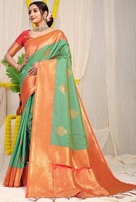 Sea green silk blend kanjivaram saree with peach zari border 1
