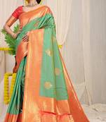 Sea green silk blend kanjivaram saree with peach zari border