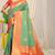 Sea green silk blend kanjivaram saree with peach zari border