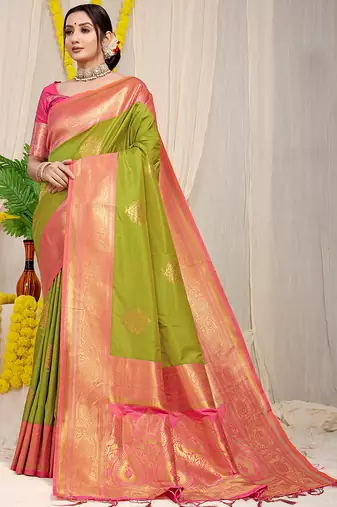 Parrot green silk blend kanjivaram saree with rani pink zari border