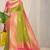 Parrot green silk blend kanjivaram saree with rani pink zari border