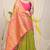Parrot green silk blend kanjivaram saree with rani pink zari border