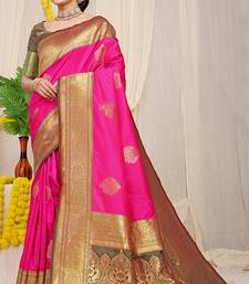 Rani pink silk blend kanjivaram saree with olive green zari border