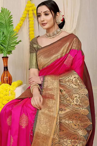 Rani pink silk blend kanjivaram saree with olive green zari border