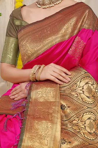 Rani pink silk blend kanjivaram saree with olive green zari border