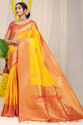 Yellow silk blend kanjivaram saree with peach zari border 1