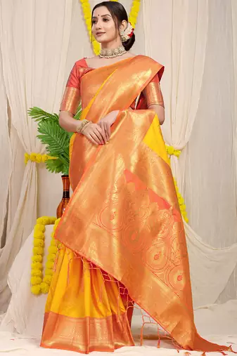 Yellow silk blend kanjivaram saree with peach zari border