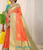 Coral orange silk blend kanjivaram saree with turquoise zari border