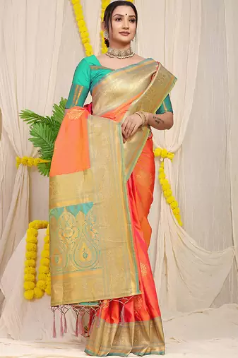 Coral orange silk blend kanjivaram saree with turquoise zari border