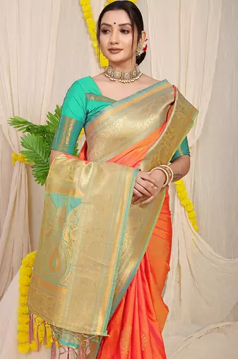Coral orange silk blend kanjivaram saree with turquoise zari border