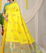 Yellow silk blend saree with rich zari paisley weaving & sea green contrast border