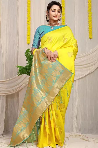 Yellow silk blend saree with rich zari paisley weaving & sea green contrast border