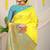 Yellow silk blend saree with rich zari paisley weaving & sea green contrast border
