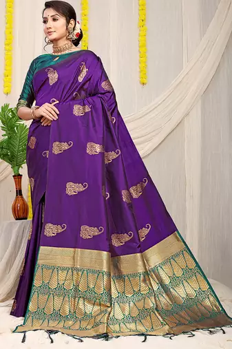 Purple silk blend saree with rich zari paisley weaving & teal contrast border