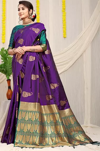 Purple silk blend saree with rich zari paisley weaving & teal contrast border
