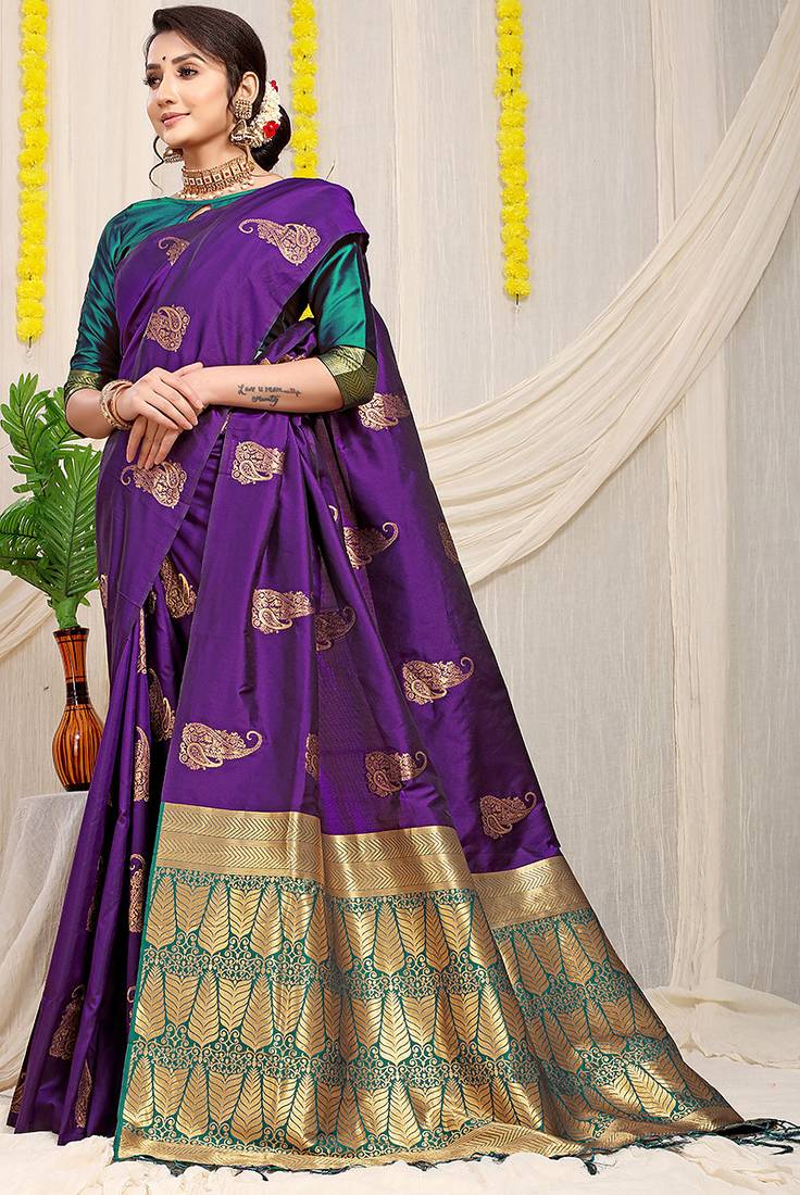 Purple silk blend saree with rich zari paisley weaving & teal contrast border