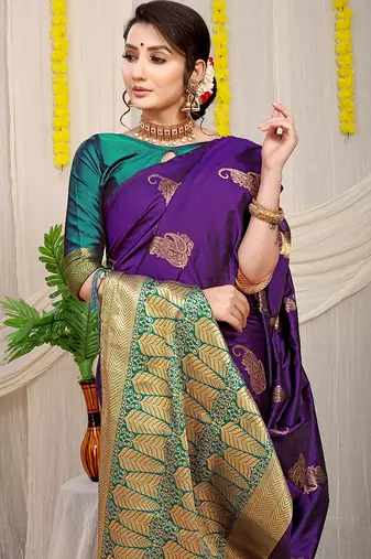 Purple silk blend saree with rich zari paisley weaving & teal contrast border