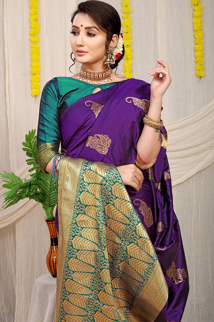 Purple silk blend saree with rich zari paisley weaving & teal contrast border