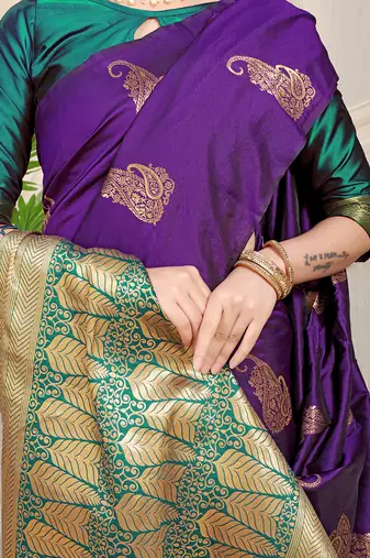 Purple silk blend saree with rich zari paisley weaving & teal contrast border
