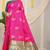 Rani pink silk blend saree with rich zari paisley weaving & teal contrast border
