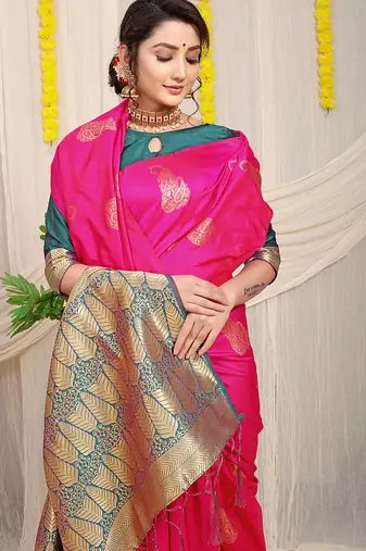 Rani pink silk blend saree with rich zari paisley weaving & teal contrast border