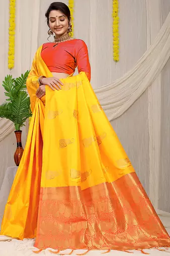 Yellow silk blend saree with rich zari paisley weaving & red contrast border