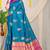 Teal blue silk blend saree with rich zari paisley weaving & magenta pink contrast border