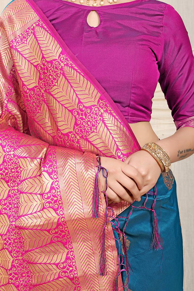 Teal blue silk blend saree with rich zari paisley weaving & magenta pink contrast border