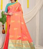 Peach silk blend saree with rich zari paisley weaving & turquoise contrast border