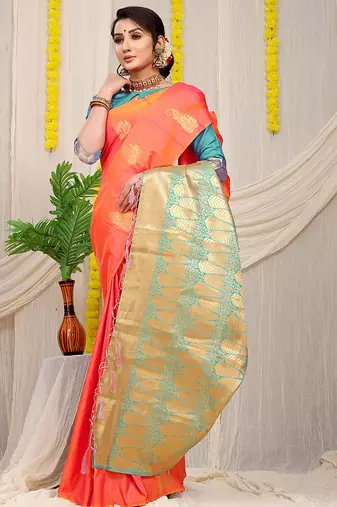 Peach silk blend saree with rich zari paisley weaving & turquoise contrast border