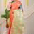 Peach silk blend saree with rich zari paisley weaving & turquoise contrast border