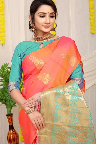 Peach silk blend saree with rich zari paisley weaving & turquoise contrast border