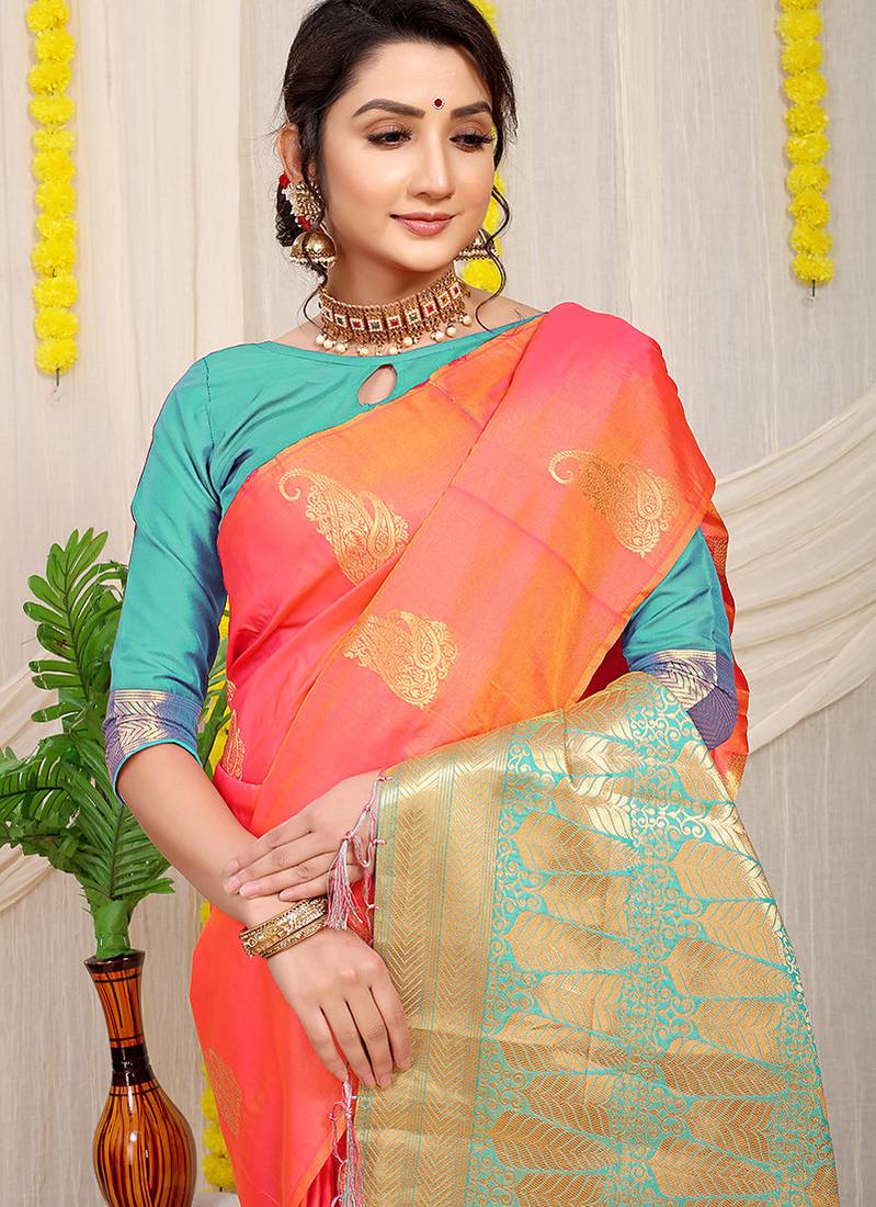 Peach silk blend saree with rich zari paisley weaving & turquoise contrast border
