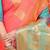 Peach silk blend saree with rich zari paisley weaving & turquoise contrast border