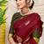 Maroon silk blend saree with rich zari paisley weaving & olive green contrast border