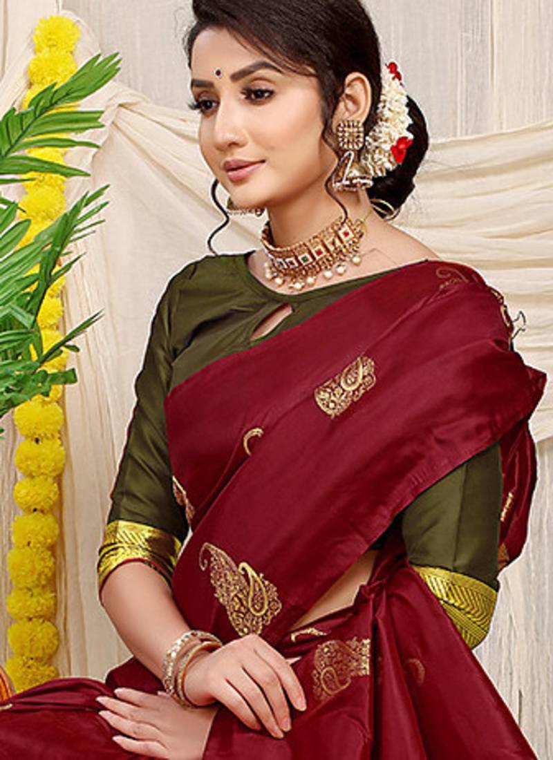 Maroon silk blend saree with rich zari paisley weaving & olive green contrast border