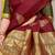 Maroon silk blend saree with rich zari paisley weaving & olive green contrast border