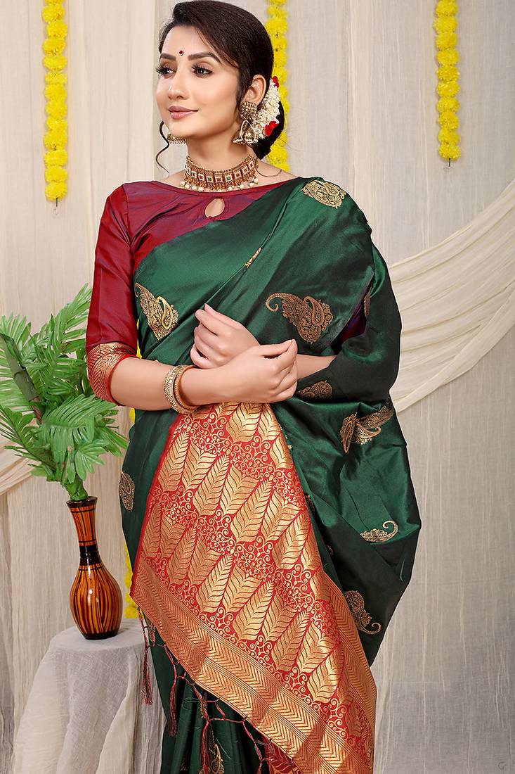 Bottle green silk blend saree with rich zari paisley weaving & maroon contrast border