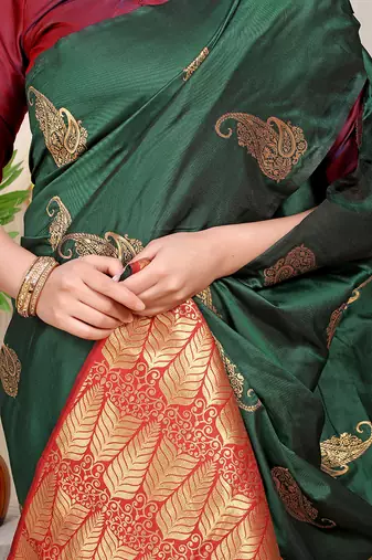 Bottle green silk blend saree with rich zari paisley weaving & maroon contrast border