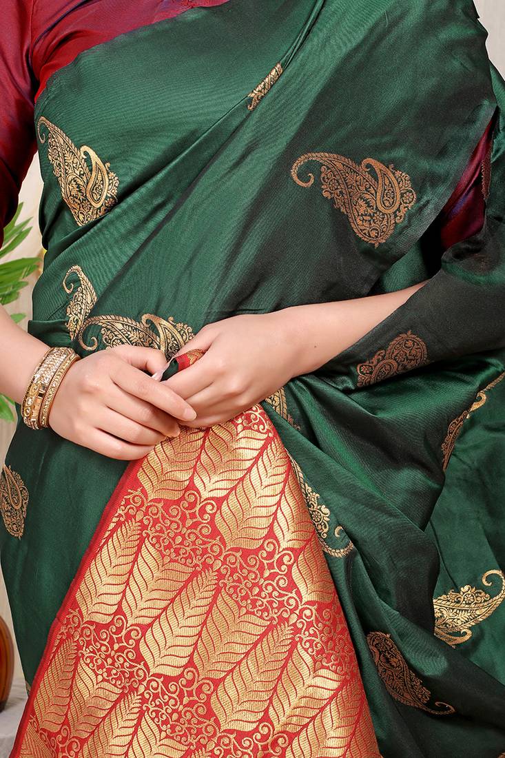 Bottle green silk blend saree with rich zari paisley weaving & maroon contrast border