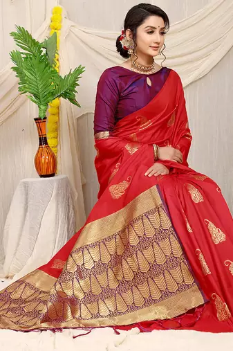 Red silk blend saree with rich zari paisley weaving & purple contrast border