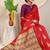 Red silk blend saree with rich zari paisley weaving & purple contrast border