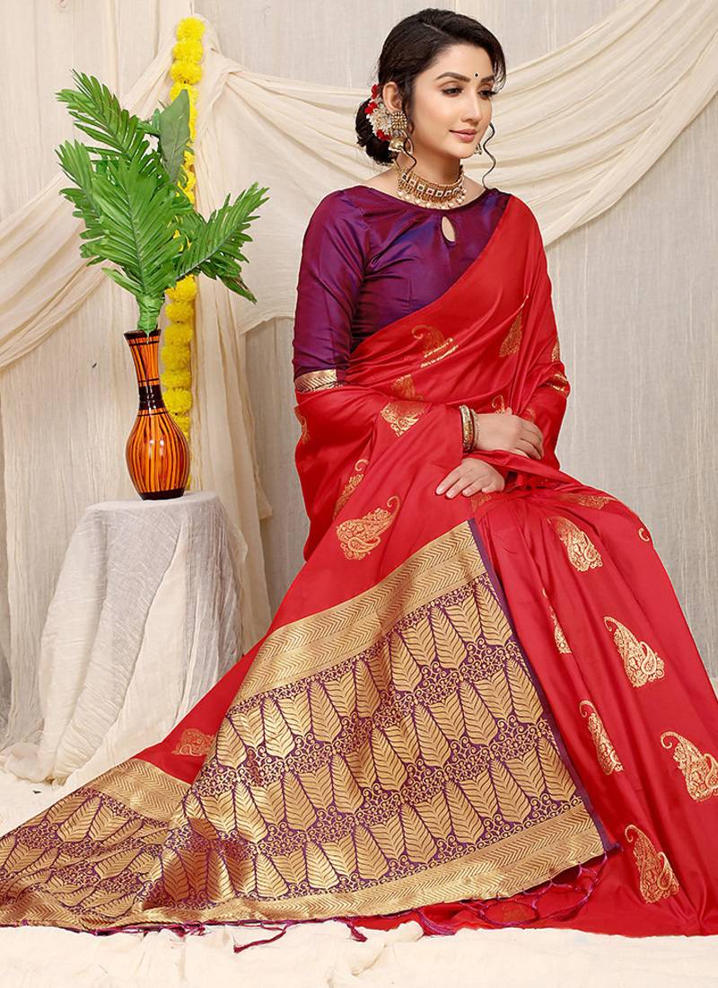 Red silk blend saree with rich zari paisley weaving & purple contrast border