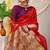 Red silk blend saree with rich zari paisley weaving & purple contrast border