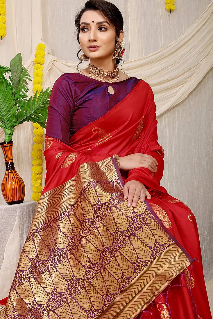 Red silk blend saree with rich zari paisley weaving & purple contrast border