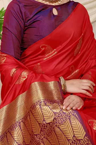 Red silk blend saree with rich zari paisley weaving & purple contrast border