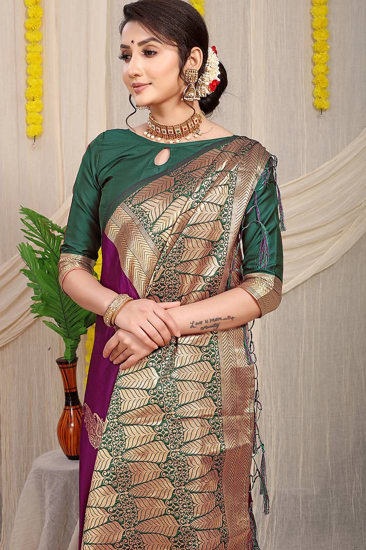 Wine silk blend saree with rich zari paisley weaving & dark green contrast border